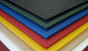 High-performance plastic sheeting in black, green, blue, red, yellow, brown, and white.