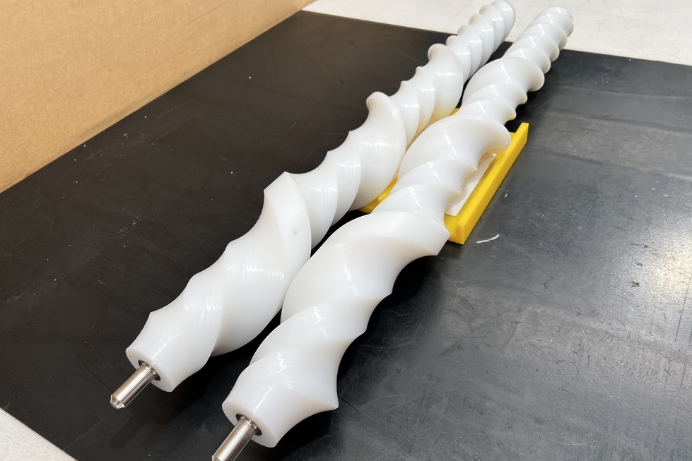 Two feed screws designed by Supply Services for a client’s production line.